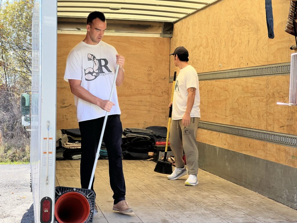 Cleaning the JR Moving Services truck